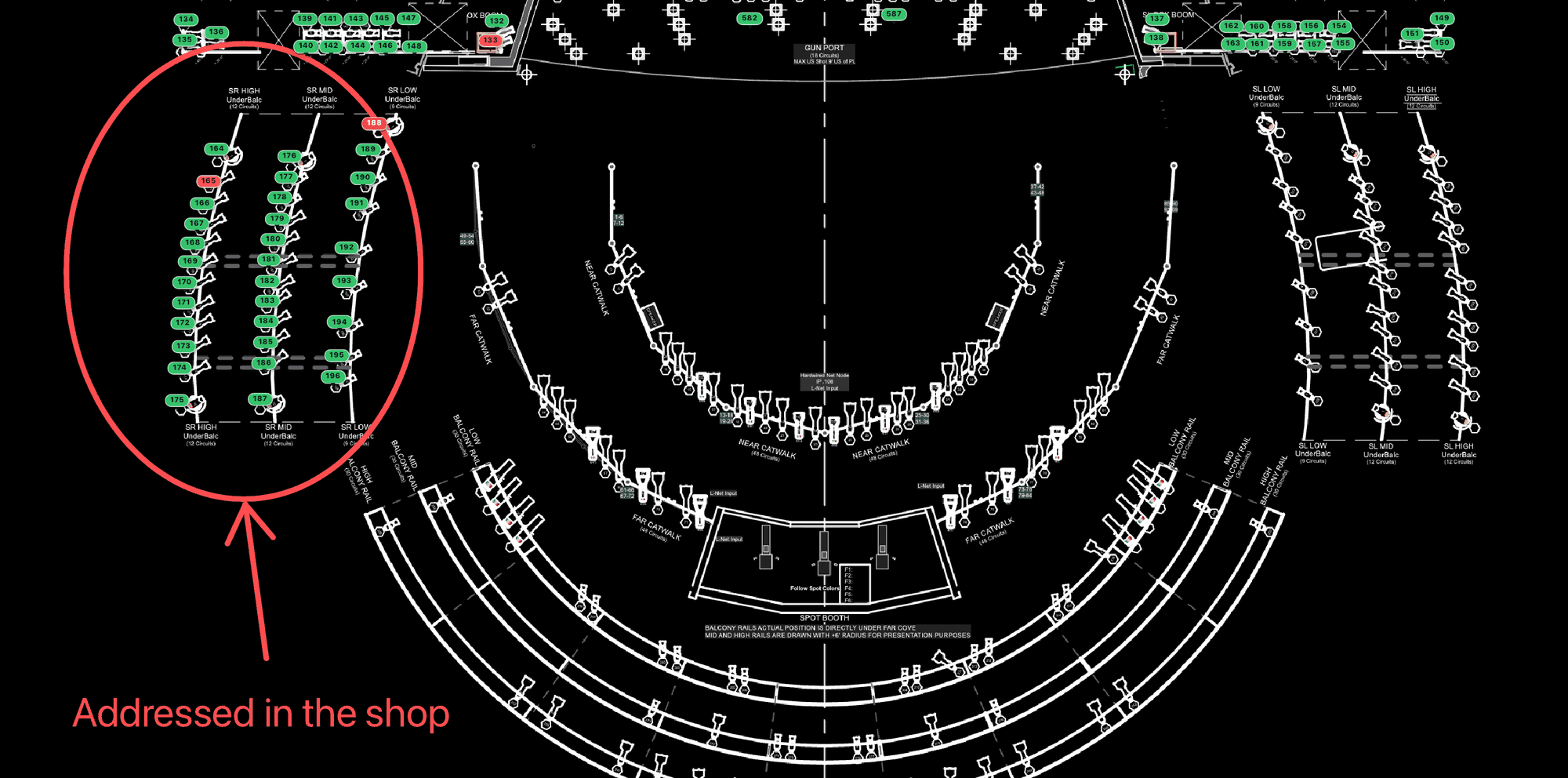 A floor plan covered in colored gear pins, with a run of lighting positions circled in red and a handwritten note beside it reading &ldquo;Addressed in the shop&rdquo;.