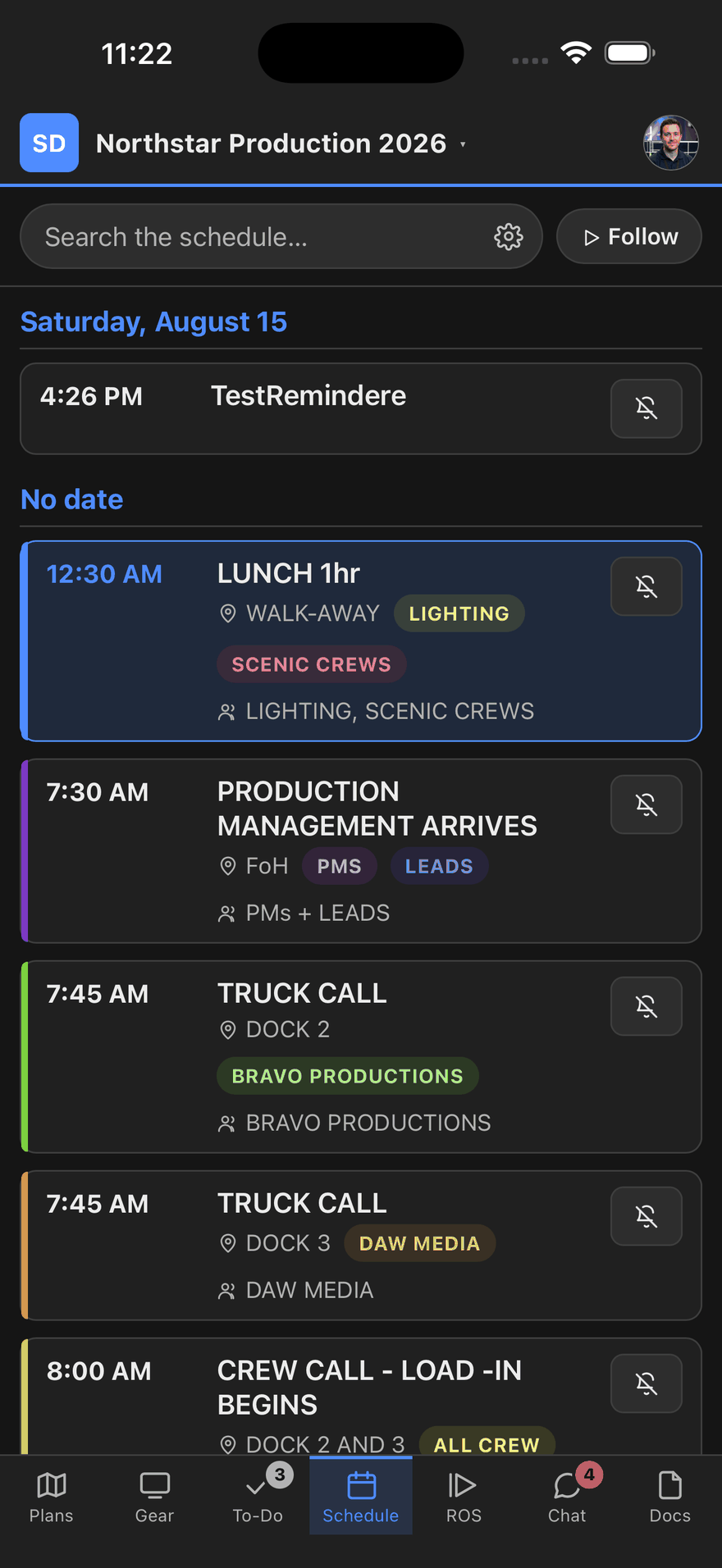 The show schedule on a phone: a day of calls with times down the left, each tagged with the department and room it belongs to.